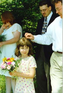 Me, officiating at the lakeside wedding.