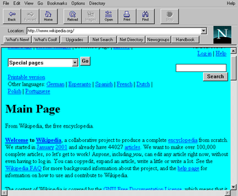 The image displays an early version of the Wikipedia homepage, featuring a bright blue background with text in a simple layout. It includes a welcome message and links to various language versions, along with navigation options typical of web browsers from the early 2000s.